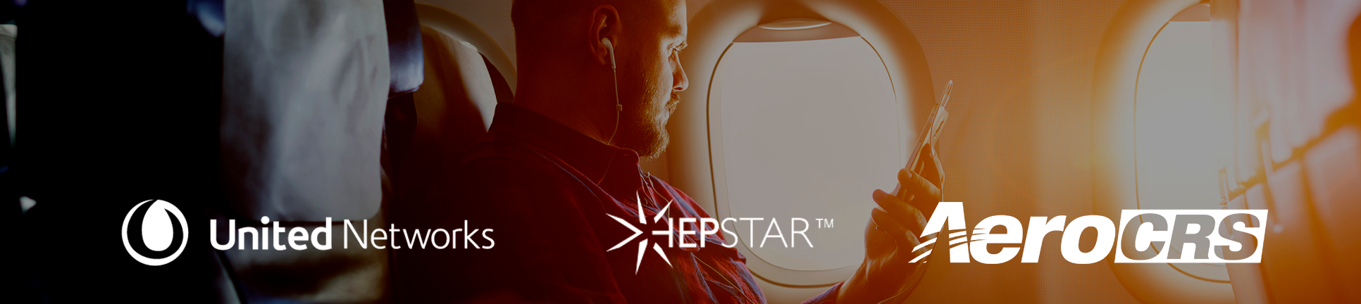 man sitting at airplane window holding a phone with logos of aerocrs, united networks and hepstar